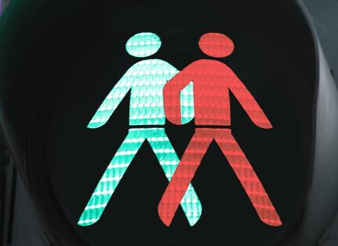 Traffic light showing red and green figures